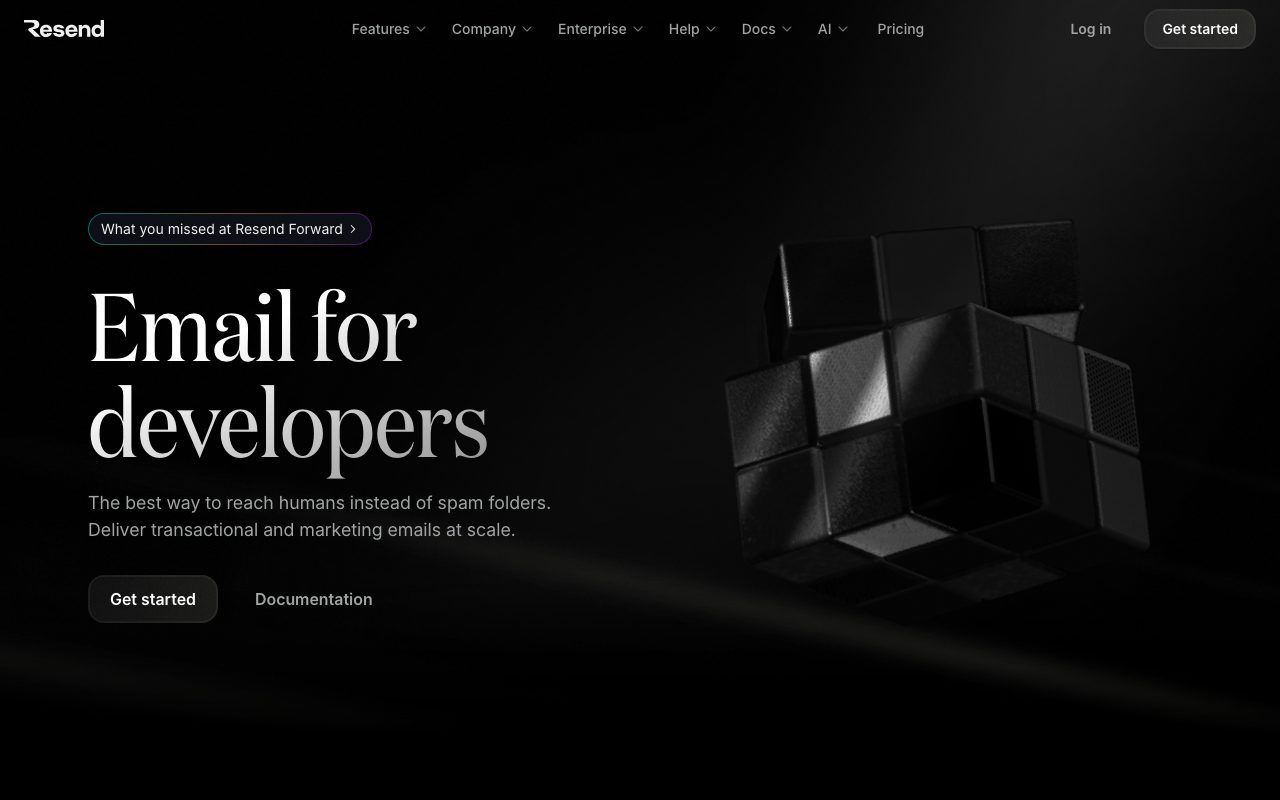 Resend homepage with a dark hero, a serif headline reading Email for developers, and a three-dimensional cube on the right